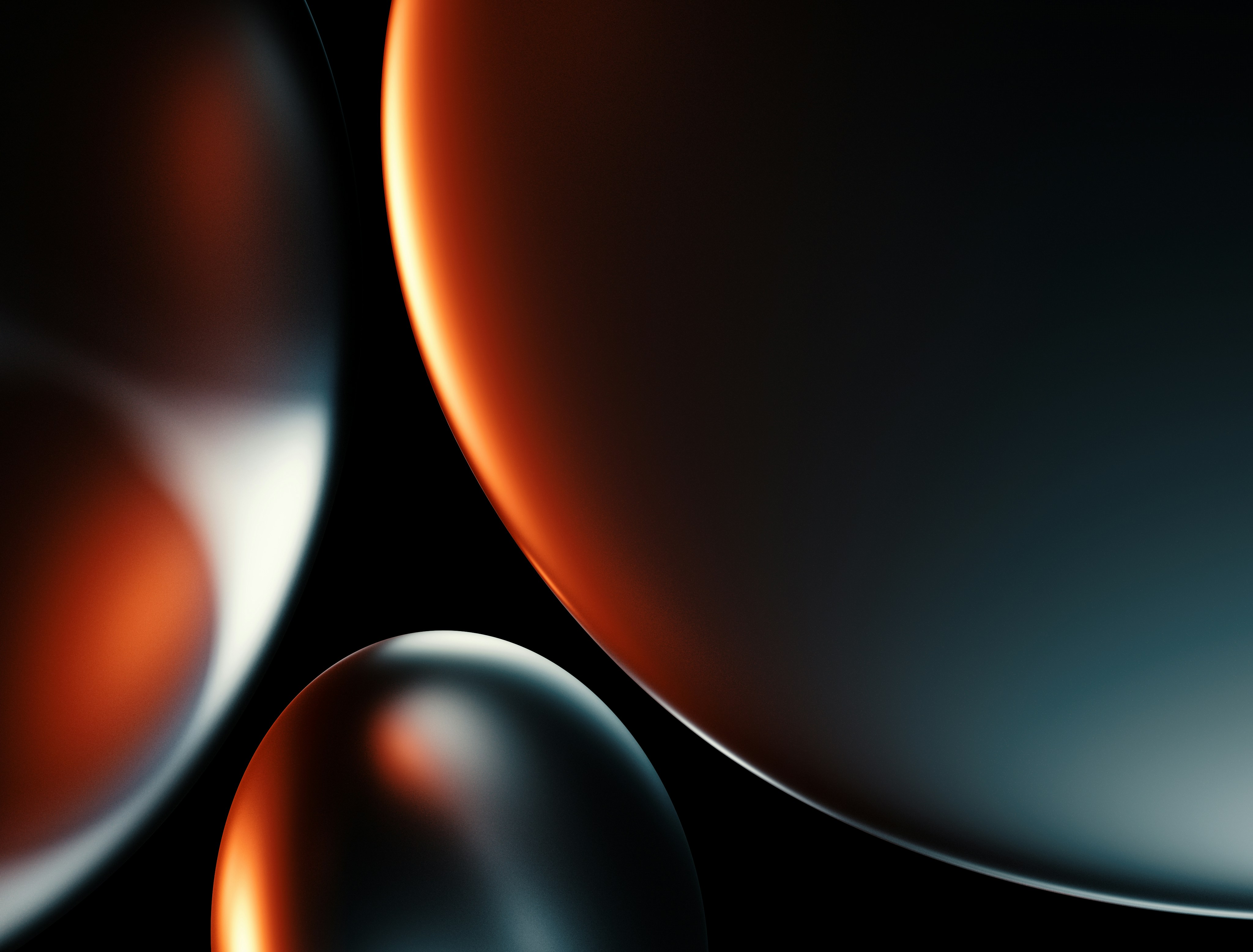 A textured black surface with flowing, organic ridges and scattered red specks, resembling sand dunes or fabric folds.